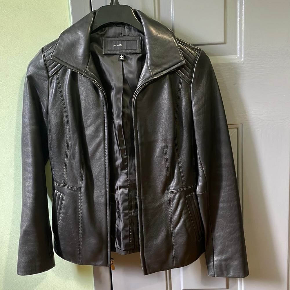 Avanti brand is small size 100% leather jacket. I love it but it’s little small.